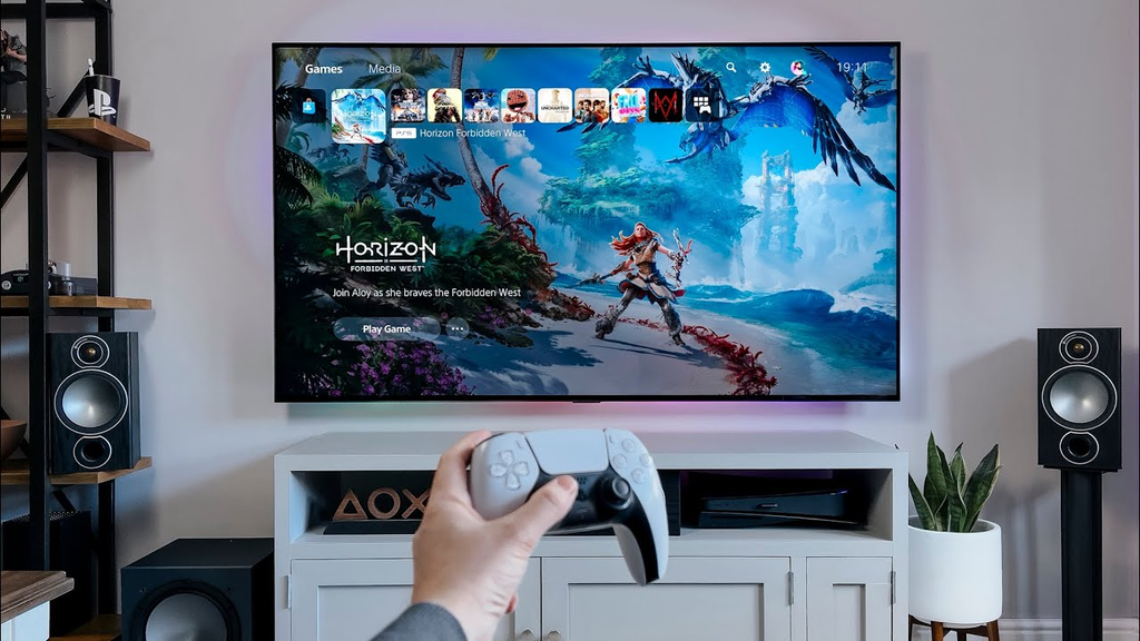 Illustration comparing a PlayStation 5 setup with a desktop gaming PC build.